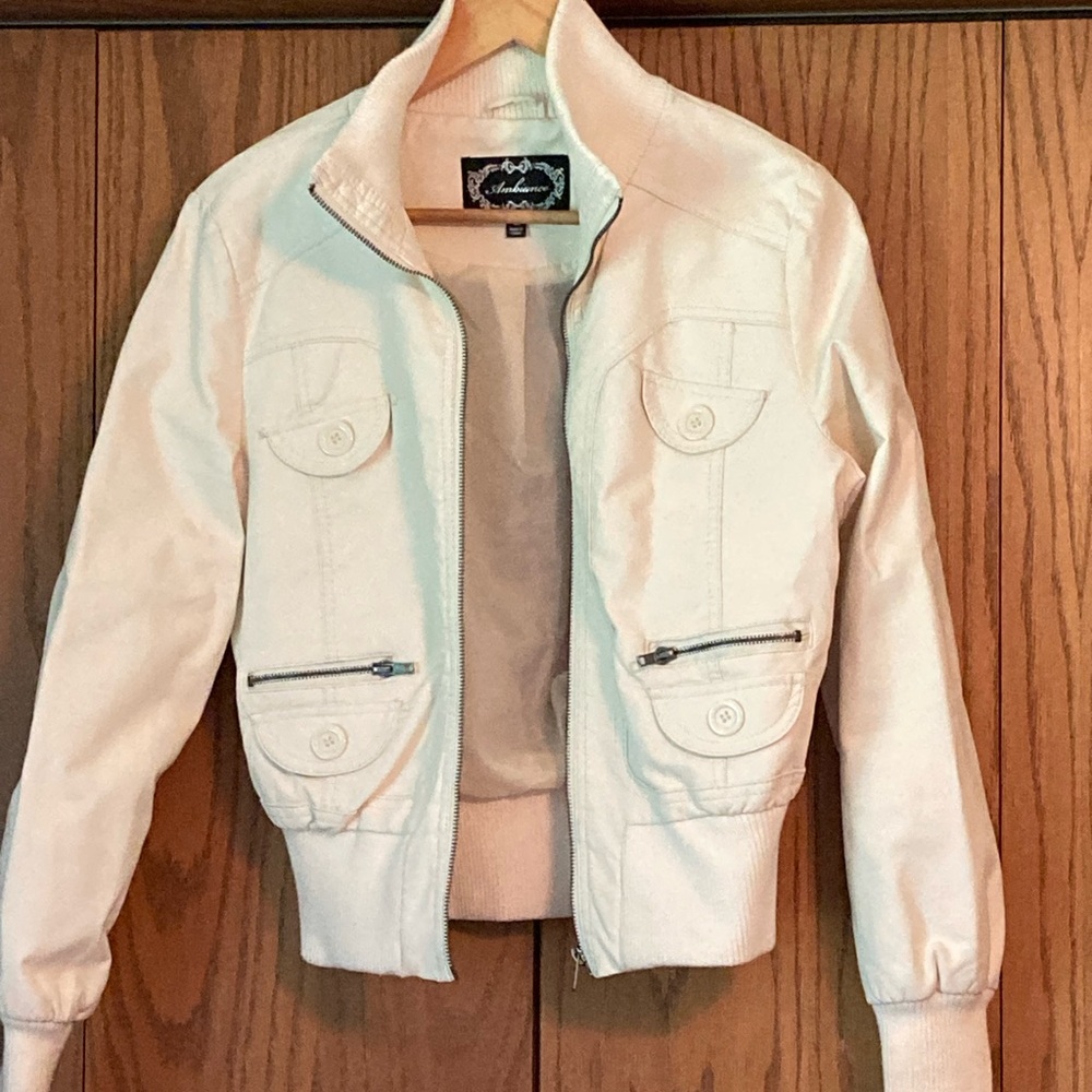 Off white fake leather jacket with silky lining.